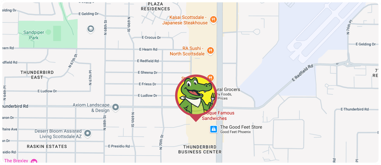 Map of Scottsdale, Arizona, with a red pin featuring a green alligator mascot holding a fork, indicating a restaurant location between Arcadia and Old Town Scottsdale.