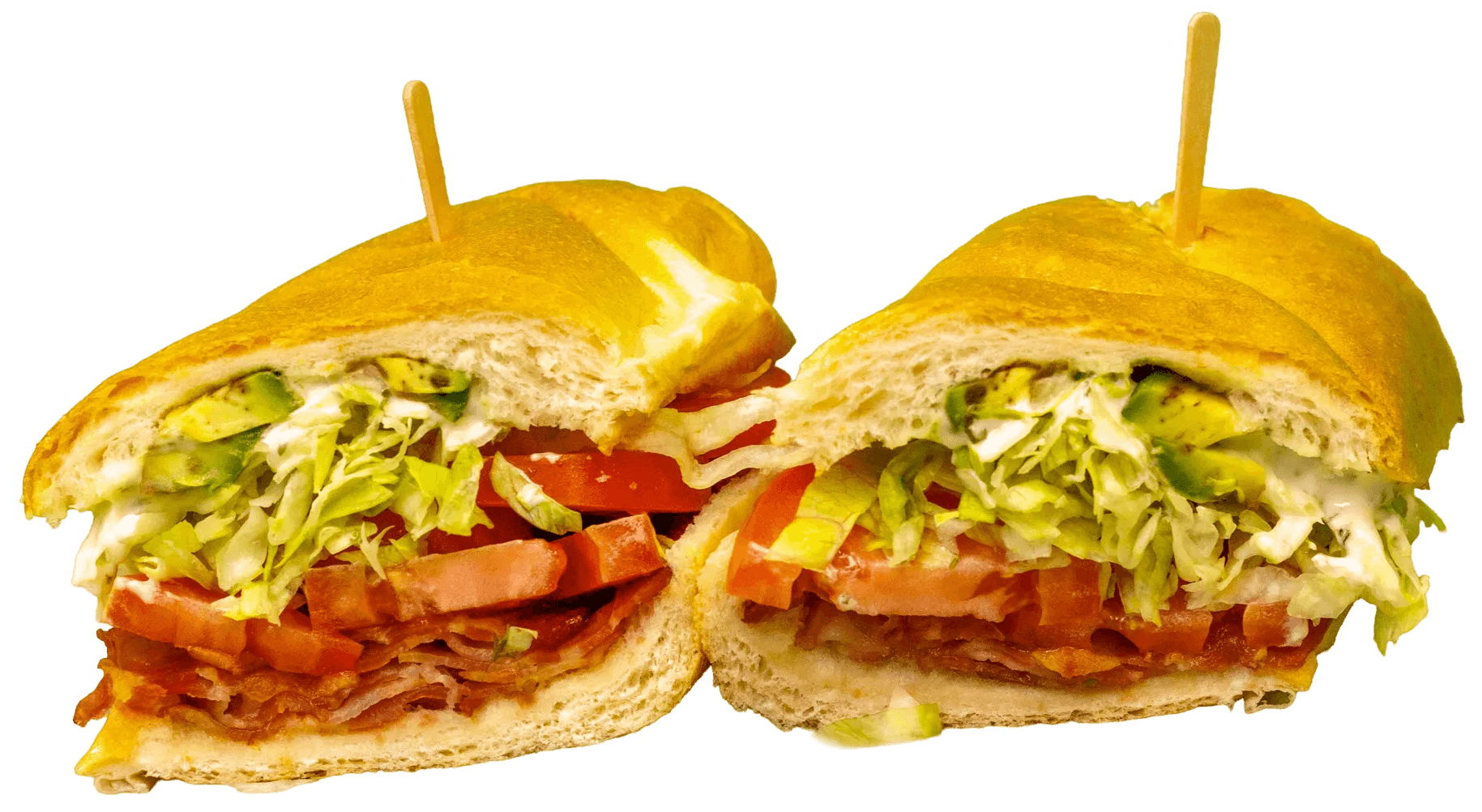 A large sub sandwich, cut in half, reveals crispy bacon, shredded lettuce, tomato, avocado, and white sauce on a golden, toasted roll.