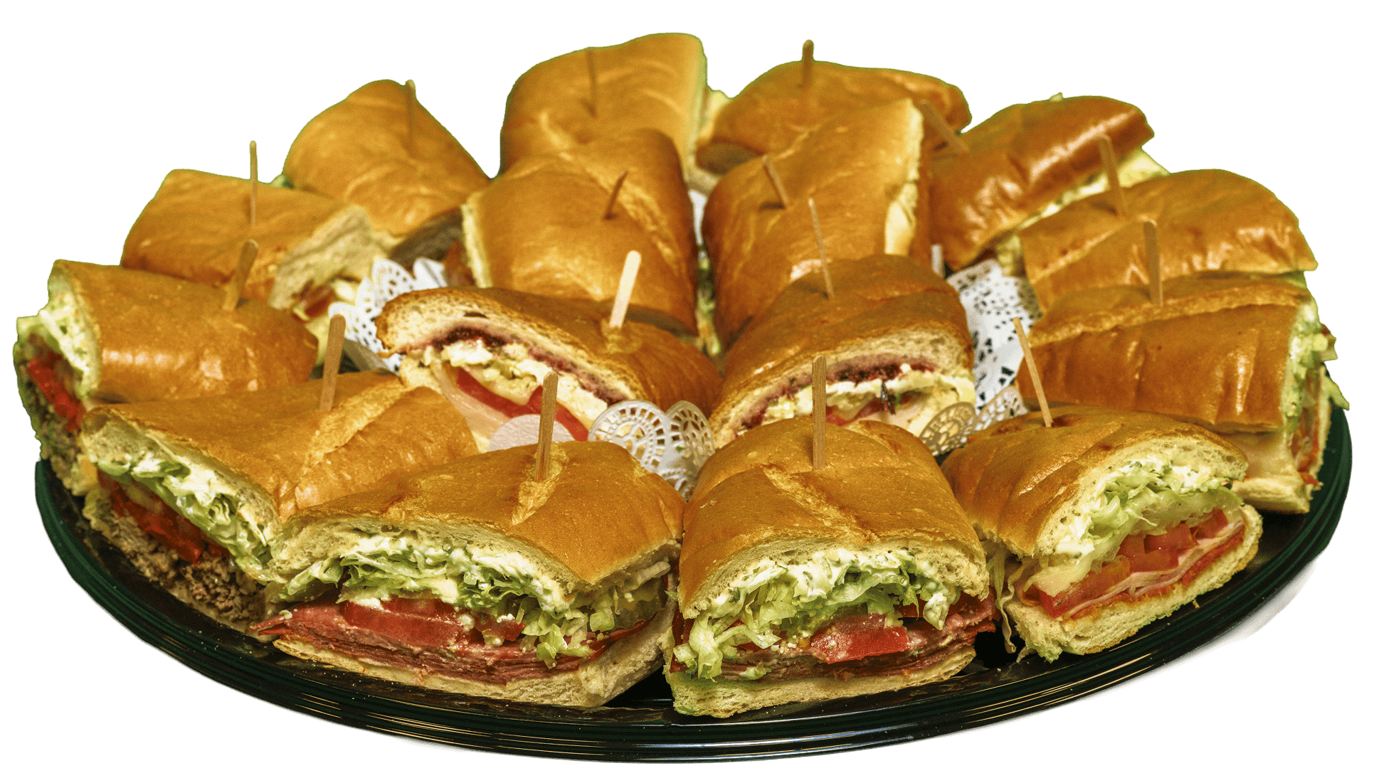 A large black catering platter filled with many half-cut sub sandwiches, displaying diverse fillings of deli meats, cheeses, lettuce, and tomatoes, each secured with a toothpick.